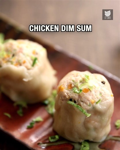 Learn how to make delicious Chicken Dim Sum at home. These soft, steamed dumplings are filled with a juicy chicken mixture and served with spicy soy chilli sauce – the perfect Asian treat.😍 Host: Varun Inamdar Ingredients: For the casing 1 cup refined flour 2/3 cup hot water Salt to taste 4 tbsp refined flour for dusting For the filling 250 grams chicken mince 1 tsp soy sauce 4 tbsp carrot finely chopped 1 tbsp garlic finely chopped 1 tbsp spring greens finely chopped 1 tbsp finely chopped cele