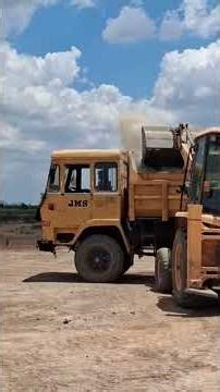 New jcb 3dx backhoe loader loading sand on truck very fast loading