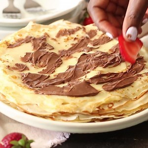 Light, tender and slightly sweet CREPES that make for a fancy breakfast filled with your favorite fresh fruit, Nutella or dusted off with powdered sugar and whipped cream on the side. Simply, easy, tasty and fancy! RECIPE: https://www.africanbites.com/easy-crepes-recipe/ | Immaculatebites