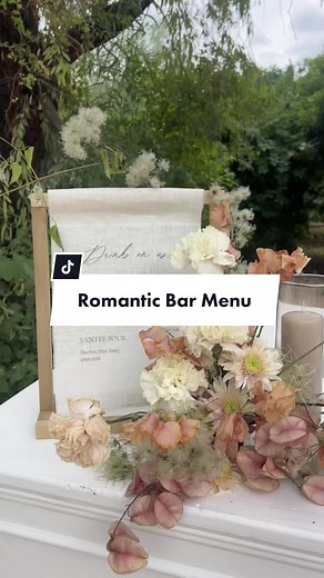I could stare at this moment all day 🫶🏼 #weddingtiktok #weddingdesign #linen #barmenusign #barmenu #florals @Floraltique