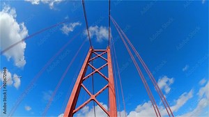 Driving over the famous 25th of April Bridge in Lisbon also called Salazar Bridge - travel photography Stock Video