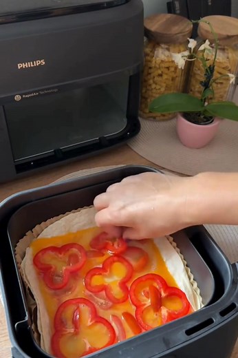 63K views · 421 reactions | Ingredients: 2 Leaf Tortilla 4 chicken eggs Hard cheese 30 g 0.5 bell peppers Mozzarella cheese small 5 6 Balls Salt Black ground pepper Dried Garlic I put in an aerogrill for 170 ° 10 minutes Bon appetit.~~ #airfryerrecipes #followersreelsfypシ゚viralシfypシ゚viralシ #fbviralvideo2025 #fypreelsシ゚viralシ #foryouシpage #fb | Air Fryer Free Recipes | Facebook