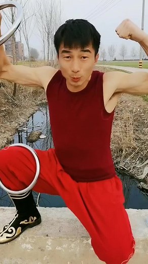 Kung Fu Stretching Demonstration in Scenic Outdoor Setting