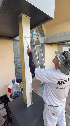 Would you paint these wood columns white or black? 🎨 #diy #painting #woodprimer #construction #new