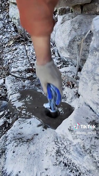 Pouring Thick Liquid in Natural Rocky Environment