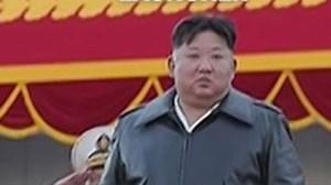 Kim Jong Un drives nuclear-capable launcher
