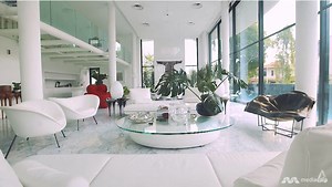 A 9,300 sq ft home in Singapore with glass floors and plenty of curves