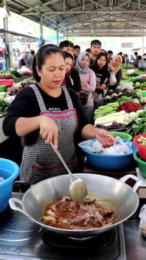 Mother Cooking Jumbo Rat Dish at a Clean Traditional Market
