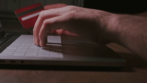 clip-4003204759-hand-red-card-input-on-keyboard-person