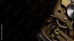 working clockwork gears (clock mechanism) inside a vintage clock