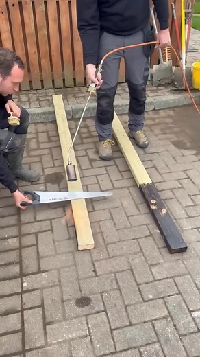 Still making great progress on site!🙌 Here’s a look at the technique the team used to create the torched wood effect, carefully forming a sharp edge between the timber and the torched finish. This attention to detail gives the wood a clean, defined look that really stands out. After creating that sharp edge, the team are now fitting the torched wood against the timber sleeper beds. This garden is really starting to take shape, we can't wait to show you the final result! #CruachanLandscaping #Ce