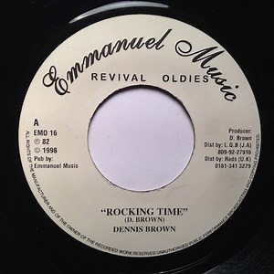 Dennis Brown - Rocking Time / Caress Me Girl