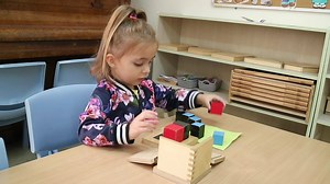 The Binomial Cube is one of the Montessori materials that make up the Sensorial Curriculum. The material is comprised of 8 wooden blocks that, when put together correctly, create a cube. The blocks are colour coded, different sizes, and fit together to create a binomial pattern that represents the cube of two numbers. The cube itself physically represents the mathematical equation (a b)³ = (a b) (a b) (a b) = a³ 3a²b 3ab² b³. ⠀⠀⠀⠀⠀⠀⠀⠀⠀ ⠀⠀⠀⠀⠀⠀⠀⠀⠀ In the early stages of learning, the Binomial Cube