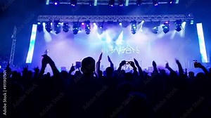 Indie Rock Band delivers a mesmerizing live performance with guitars and drums at a massive open-air concert.AI generatif 4k 60fps