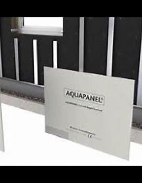 Installation of Knauf Aquapanel outdoor panel on exterior wall