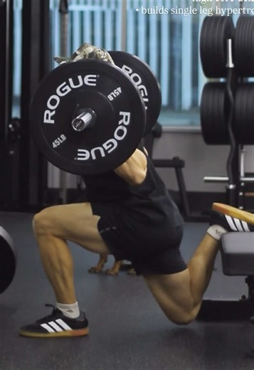 Back Rack Bulgarian Split Squats 🔥 One of the best ways to build serious single-leg strength. • Forces thoracic extension — you have to stay tall or the bar folds you forward. Huge for posture and upper-back strength. • Greater demand on hip flexion mobility — deep, controlled front hip flexion under load. • Challenges balance & stability — ankle, knee, and hip control all working together. • Eliminates grip limitations — no dumbbells holding you back. Load the legs properly. • High core demand