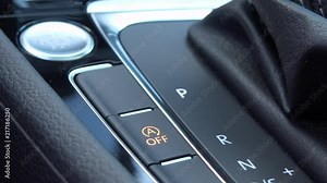 Closeup on an Automatic Start/Stop Engine button in a luxurious car Stock Video