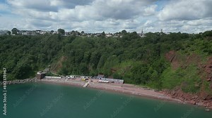 Babbacombe, South Devon, England: DRONE VIEWS: Oddicombe beach and Babbacombe Cliff Railway (left of picture) as a funicular train moves. Babbacombe is a popular English tourist destination (Clip 2).