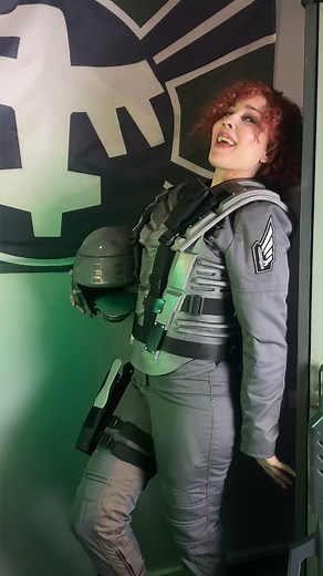 Sofía Guerrero on Instagram: "My finished Dizzy cosplay from Starship Troopers 💚 Mobile Infantry armor, Morita rifle, helmet, pouches and spats made by me. The Pants are a movie replica made by American Jackets. Would you like to know more? #starshiptroopers #DizzyFlores"