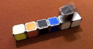 Self-propelled robotic cubes can form into structures