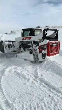 2022 Bobcat T66 snow removal with a high capacity 108” snow bucket