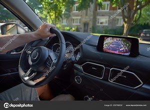 Rear View Monitor for car reverse system. Rear area image showing to driver by video camera at rear area to help for parking and prevent accident. Automotive safety technology equipment