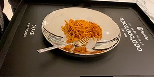 Watch Drake Enjoy Pasta Out of Spotify Plaque for 1 Billion "In My Feelings" Streams