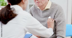 Female doctor do heartbeat check