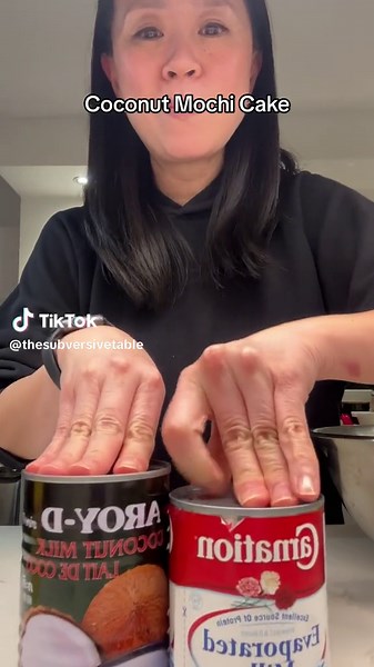 The easiest snack cake that’s squishy and gooey with the most delectable crunchy coconut crust: Coconut Mochi Cake I doubled the recipe here for a potluck but you can also make a smaller 8x8 mochi cake. Full recipe is on the blog, link on profile page A very easy, super delicious recipe thats gluten free and not too sweet! #mochicake #coconutmochicake #coconutmochi #easycake #glutinousriceflour #coconutcake #easyrecipe #asiancake #nottoosweet