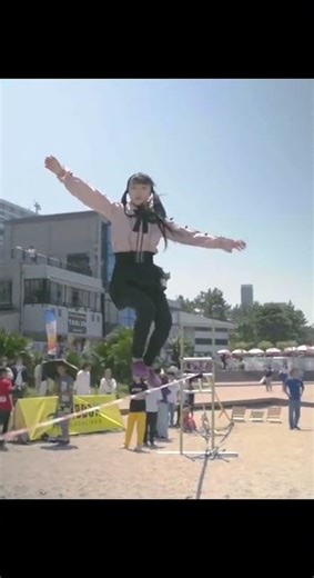 Does Amazing Flips on Slackline