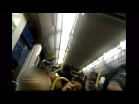 A woman (Emma West) arrested after shouting racial abuse on tram - London (ITV1 London coverage)