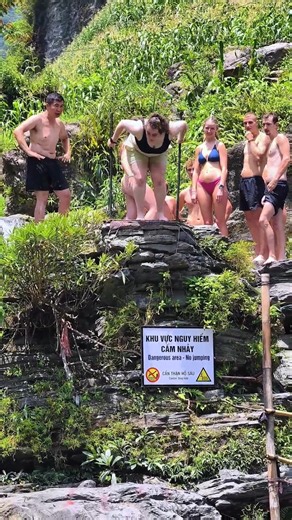 The girl almost slipped and fell at this waterfall.
