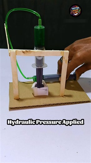 𝐌𝐨𝐭𝐨𝐫 𝐇𝐚𝐜𝐤 𝐋𝐚𝐛 on Instagram: "How Much Hydraulic Pressure Can Two Syringes Create? Ever wondered how powerful hydraulic pressure really is? 💥 In this experiment, 🔹 Two syringes are used to create hydraulic pressure 🔹 A box is placed below 🔹 Pressure is applied step by step 🔹 And the result? The box gets completely crushed 😱 This is the real power of hydraulics — Small force ➜ Massive pressure Follow @motohacklab for more mechanical experiments & hacks 🔧⚙️ 👉 Follow for more in