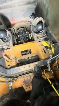 Removing leaking hydraulic hoses for repair on skid steer loader controls to pump case 420ct