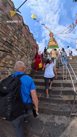 Swayambhunath Temple, also known as the Monkey Temple, is one of the most famous and sacred Buddhist sites in Kathmandu, Nepal. It sits on top of a hill and offers a beautiful view of the Kathmandu Valley. The temple is very old, more than 2,000 years, and is an important place for both Buddhists and Hindus. The white dome and golden spire of the stupa symbolize peace, wisdom, and harmony. The painted eyes of Buddha on all four sides represent awareness and compassion, watching over the world. A