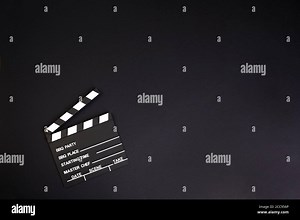 clapper board or movie slate.It is used in video production and film industry on black background. High quality photo. Copy space Stock Photo - Alamy