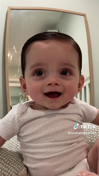 Adorable Baby Playing with Toy in Cozy Room