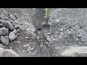 Barge unloading 4900 tons of crushed phosphate rock - Part 2 long video - Excavator working on barge