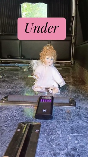 In the back of my hearse, with a haunted doll for a Spirit box session. you won't believe it.