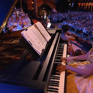 4.9M views · 253K reactions | André Rieu & Amira - #OMioBabbinoCaro  | Maria Roxana | Facebook