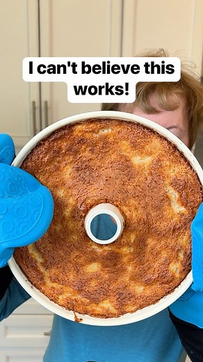 Jeff’s mom shows us how to cool angel food cake upside down using a bottle #cakes #bakinglove #angelfood #kitchentips | Liz & Jeff