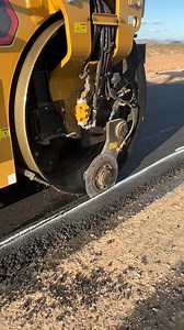 3.2M views · 25K reactions | CAT roller asphalt edge cutter attachment hitting the asphalt at the right temperature. #asphaltpaving | Pro TV | Facebook