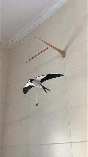 Wooden flying bird mobile