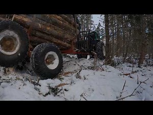Woodlot Management in Nova Scotia, Rocan T harvester and Valmet tractor hard at work.
