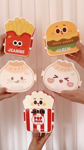 2.9K views · 15 reactions | Kawaii Snackbox for only 350 pesos with FREE personalized names 寧 Super cute ❤️ For me , I will just use these to put mga snacks with wrappers like biscuits, juice, milk etc. hindi siya for rice and ulam or pasta na anything walang wrapper. For me lang, just sharing. Nice din siya for simple giveaway  Comes with Spoon and Fork  Designs: Popcorn Burger Fries Xiao long bao Girl Xiao long bao Boy DM US TO ORDER  | toytinkr | Facebook