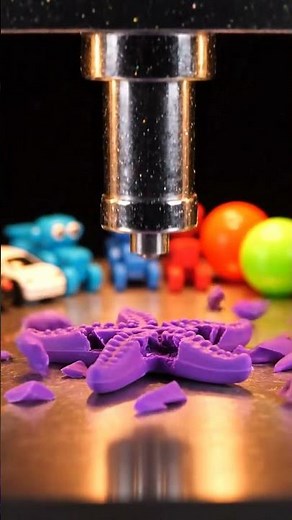 Hydraulic press crushes toy starfish