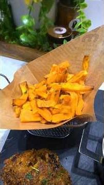 sweet potato and breaded chicken drumstick cooked in the air fryer and a vegetable stir-fry cooke...