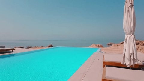 clip-3986537231-enjoying-seaside-luxury-nature-resort-ras-abroouq