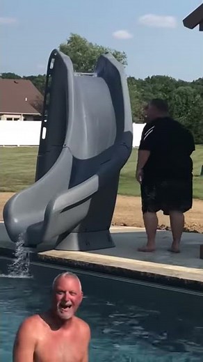 Fat Man goes down water slide
