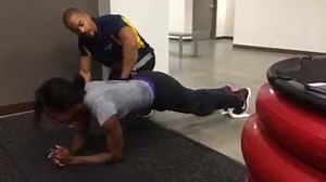 [Best Home Core Exercise Ever!] I'm here with Olympic hurdler Mel Walker. We are working on anterior core strength. This is the Plank Slide Out and can be done with a towel under your feet on a smooth surface such as a wood or polished concrete floor. Pay attention to the cues I give Mel to get the most out of this exercise. For more check out my YouTube.com/teemajorfitness channel and subscribe. For 90-day programs check out http://store.teemajor.com | Tee Major